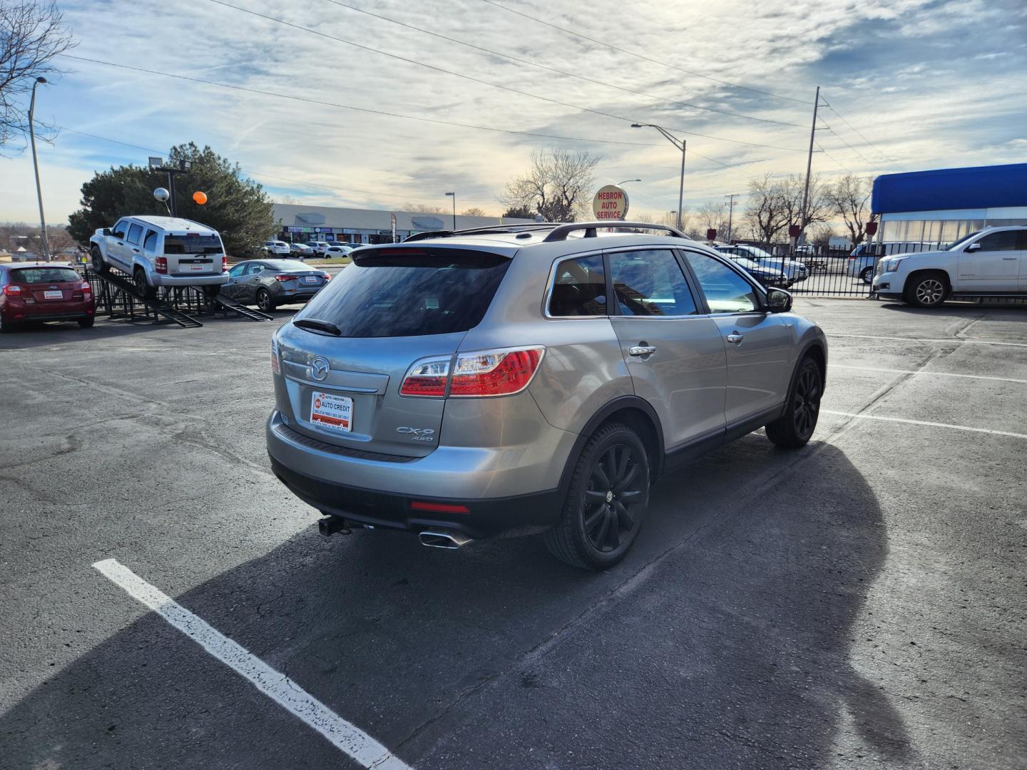 2010 Liquid Silver Metallic /Black Mazda CX-9 Grand Touring (JM3TB3MA6A0) with an 3.7L V6 DOHC 24V engine, Automatic transmission, located at 8595 Washington St., Thornton, CO, 80229, (303) 287-5511, 39.852348, -104.978447 - 2010 Mazda CX-9<br><br>D1 Auto NEVER charges dealer fees! All cars have clean titles and have been inspected for mechanical issues. We have financing for everyone. Good credit, bad credit, first time buyers.<br><br>Please call Lakewood Location 303-274-7692 or Thornton 303-287-5511 to schedule a tes - Photo#5